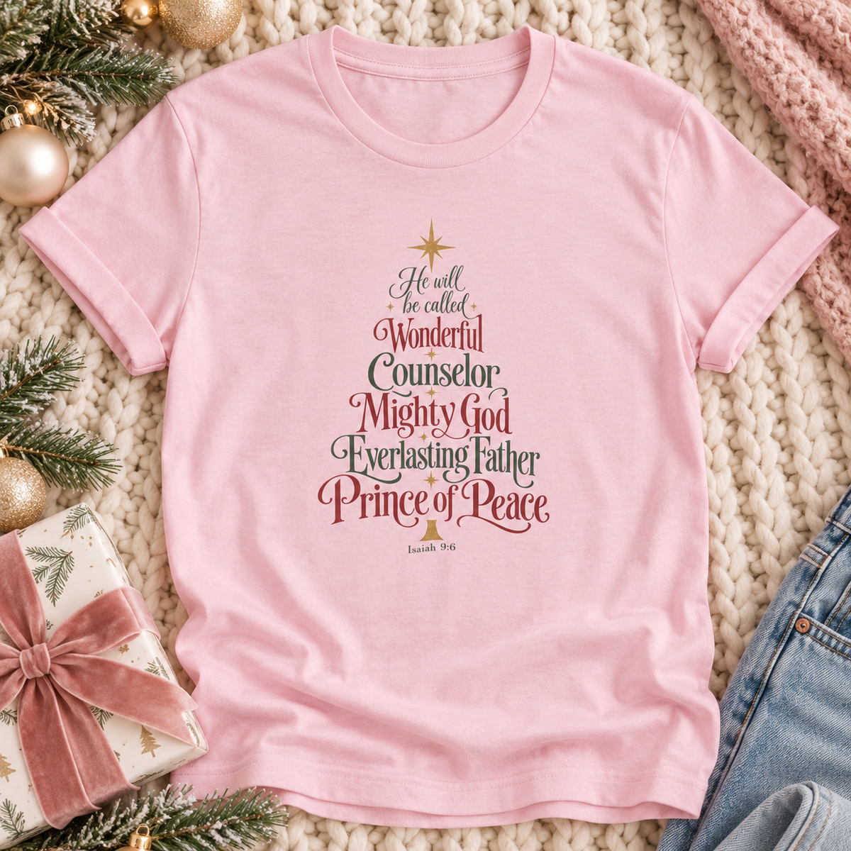 Pink short-sleeve T-shirt with “He Will Be Called” lettering, the names of Christ, and Isaiah 9:6.